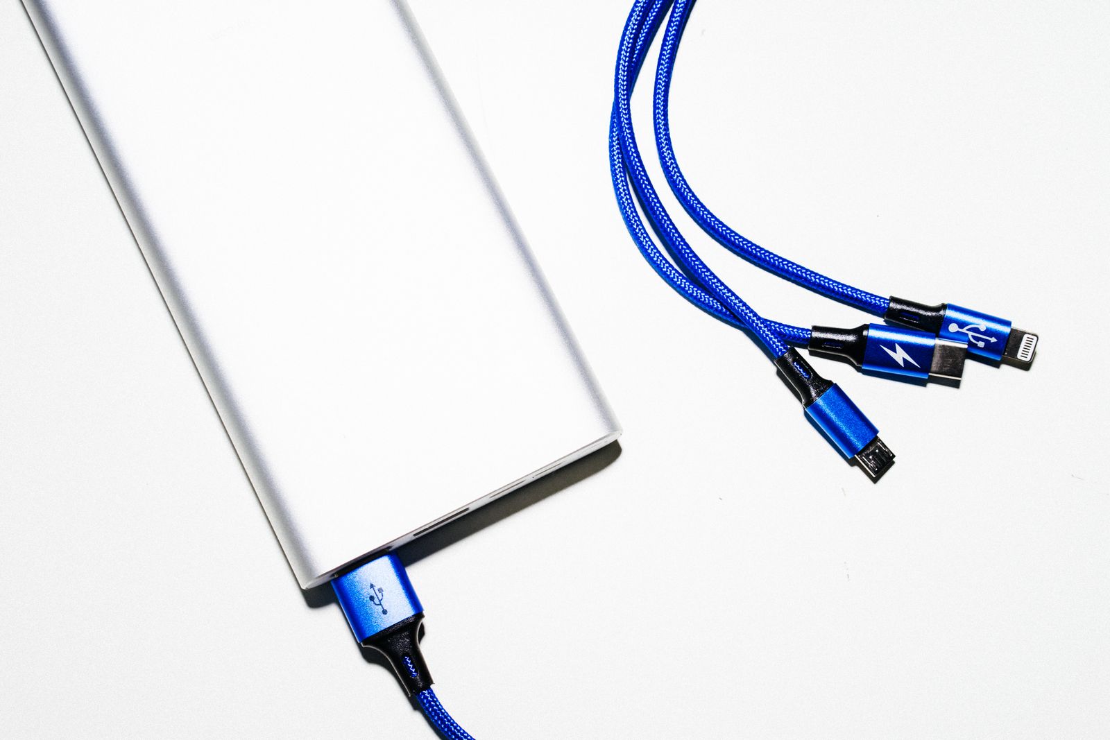 Power bank and USB charging cables, like those used to recharge High Beam shoes
